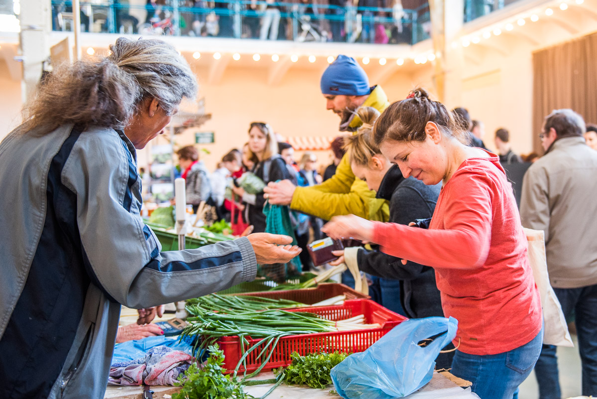 Market in Stara trznica with people and food