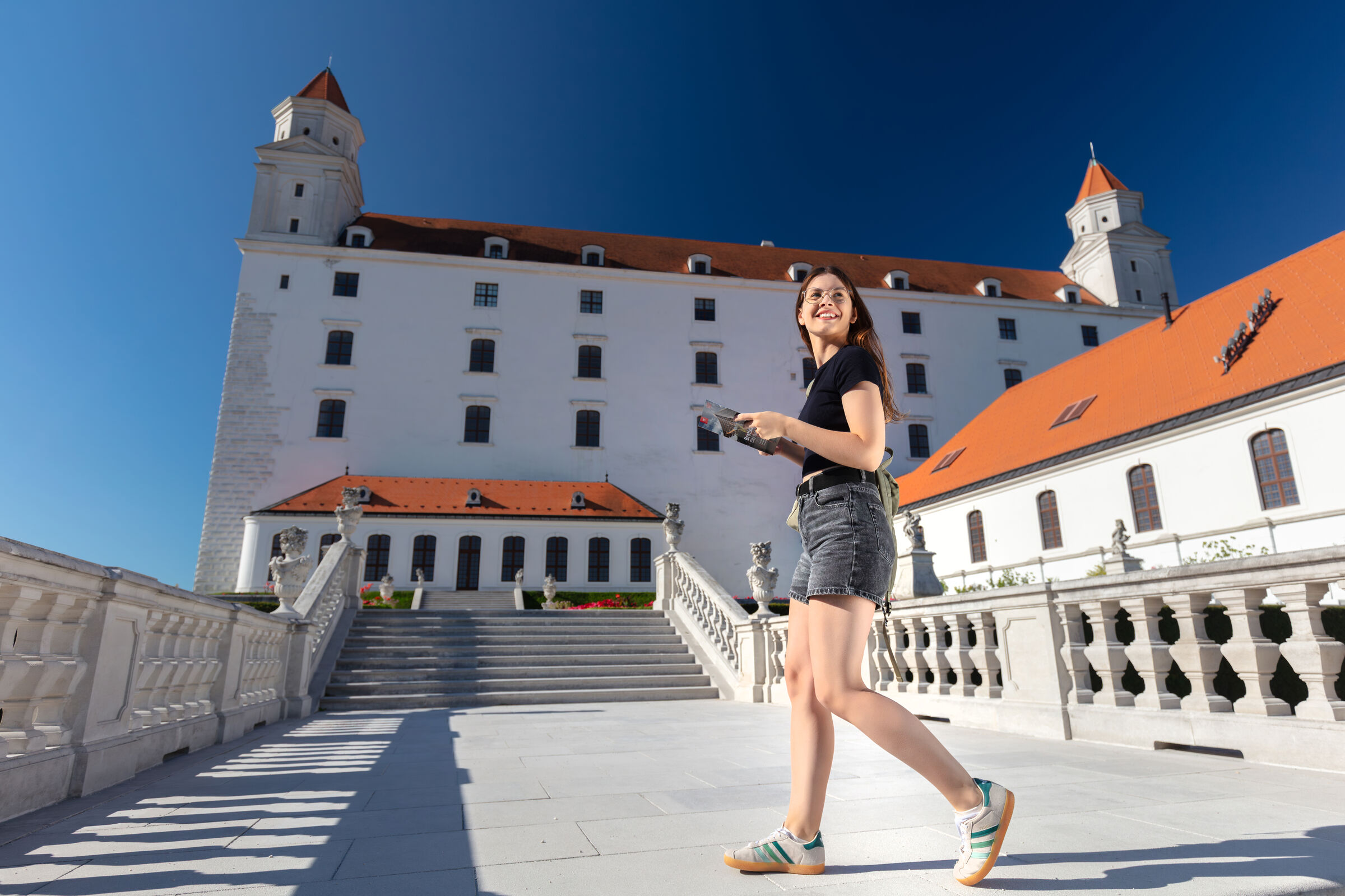 women in front od bratislava castle