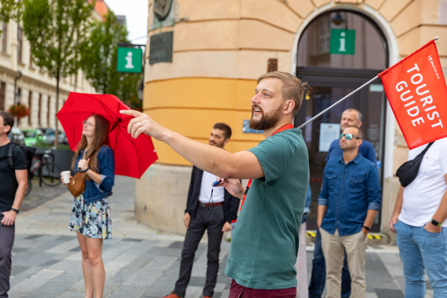 Bratislava old town tour guide leading a group of tourists
